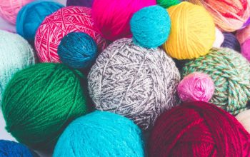 Colored balls of yarn. Colorful background with yarn ball